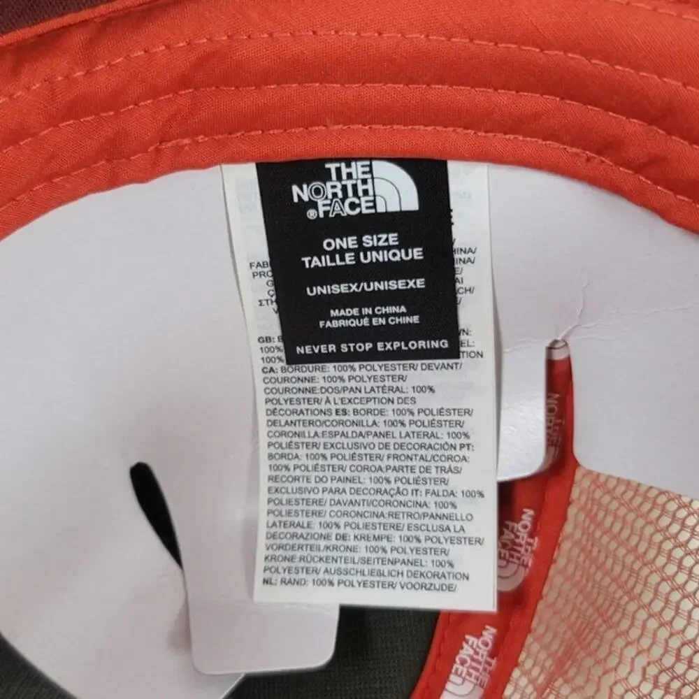 THE NORTH FACE LOGO TRUCKER HAT IN SUMAC, MARS DUST
